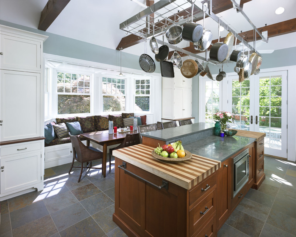 Kitchen - transitional kitchen idea in Philadelphia with wood countertops, recessed-panel cabinets and white cabinets