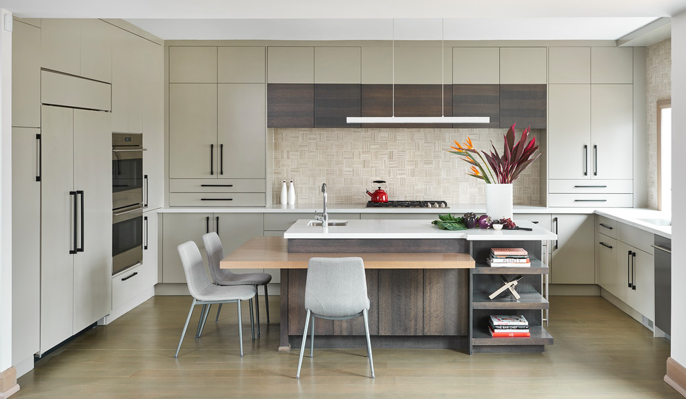 Inspiration for a large modern u-shaped medium tone wood floor and gray floor open concept kitchen remodel in Toronto with an undermount sink, flat-panel cabinets, beige cabinets, quartz countertops, beige backsplash, marble backsplash, paneled appliances and an island