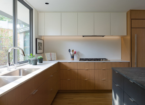 Modern Canadian kitchen with RTA cabinets combining sleek wood finishes and minimalist design for long-term durability