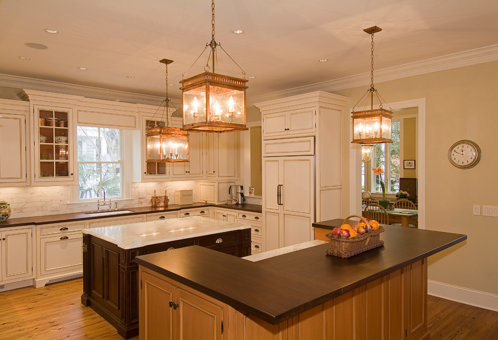 Inspiration for a timeless kitchen remodel in Charleston with wood countertops