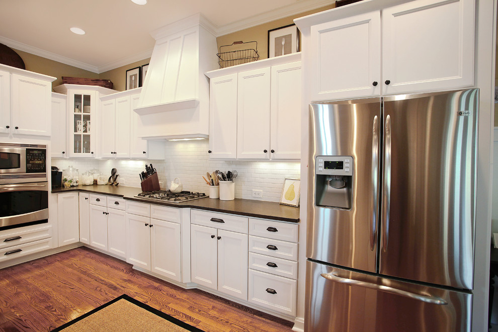 Photo of a farmhouse kitchen in Charlotte.