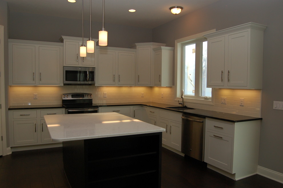Example of a transitional kitchen design in Omaha