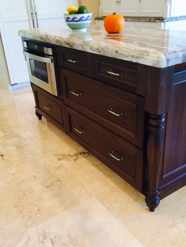 Mid-sized transitional marble floor kitchen pantry photo in Miami with flat-panel cabinets, dark wood cabinets, quartzite countertops, stainless steel appliances and an island