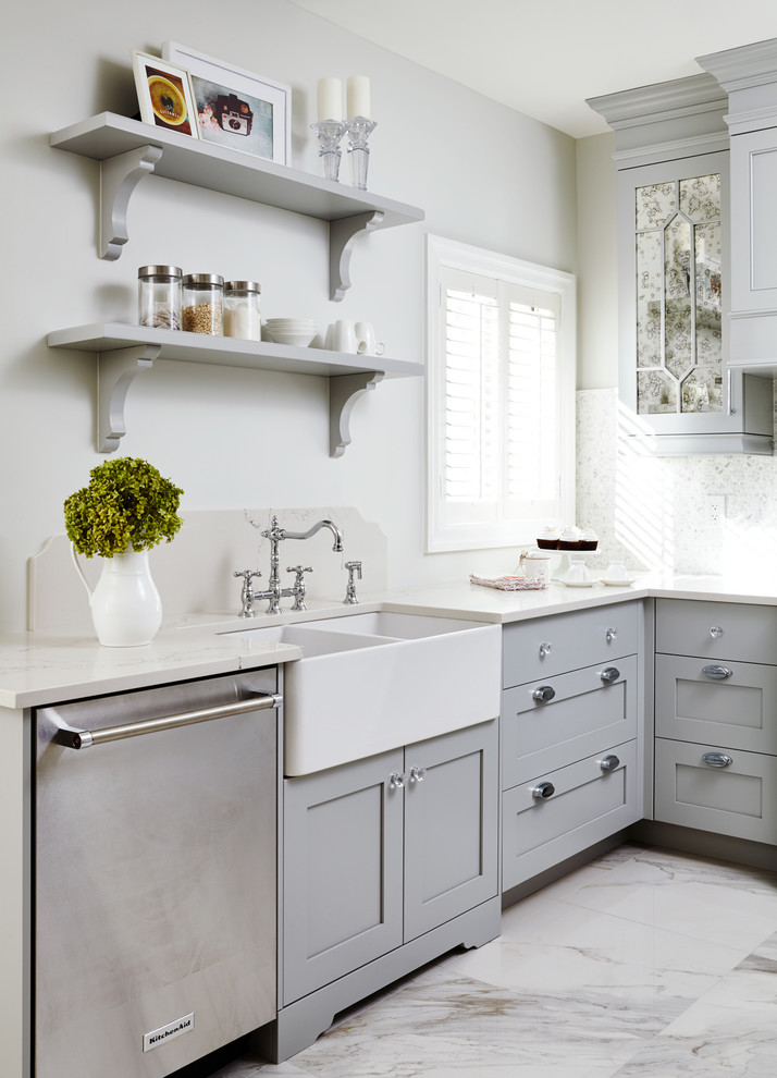 Kitchen - small traditional l-shaped kitchen idea in Toronto with a farmhouse sink, shaker cabinets, gray cabinets and stainless steel appliances