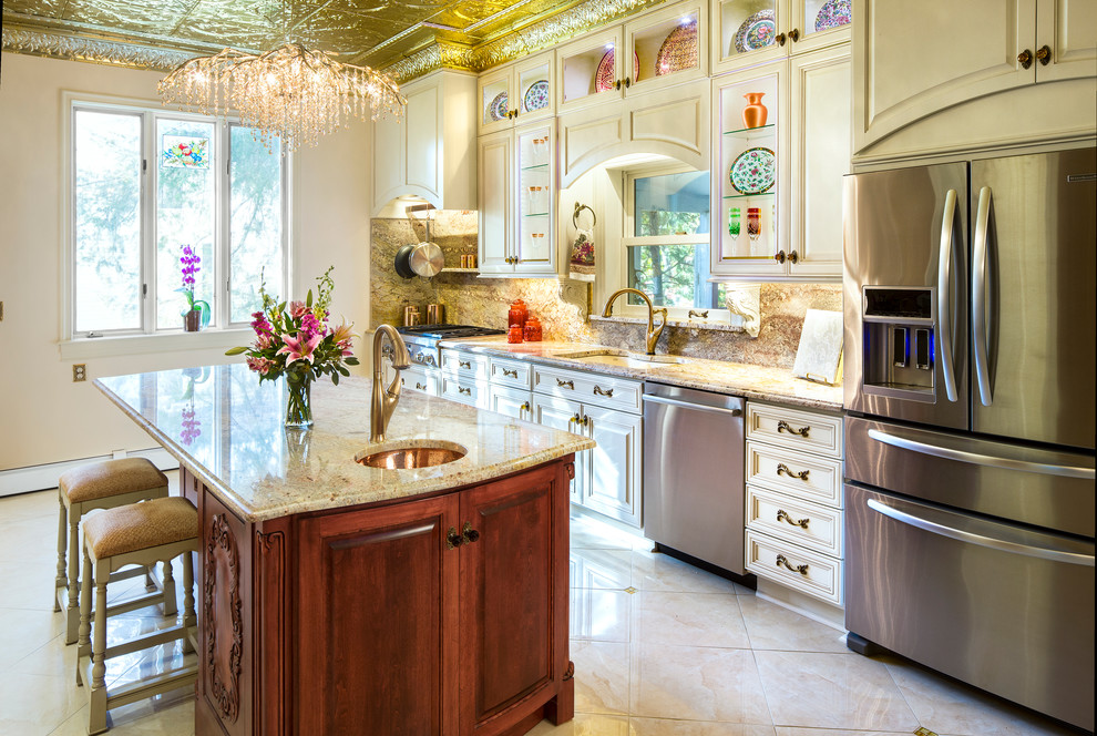 Large ornate galley porcelain tile and beige floor enclosed kitchen photo in Cedar Rapids with an undermount sink, raised-panel cabinets, white cabinets, granite countertops, multicolored backsplash, stone slab backsplash, stainless steel appliances and an island