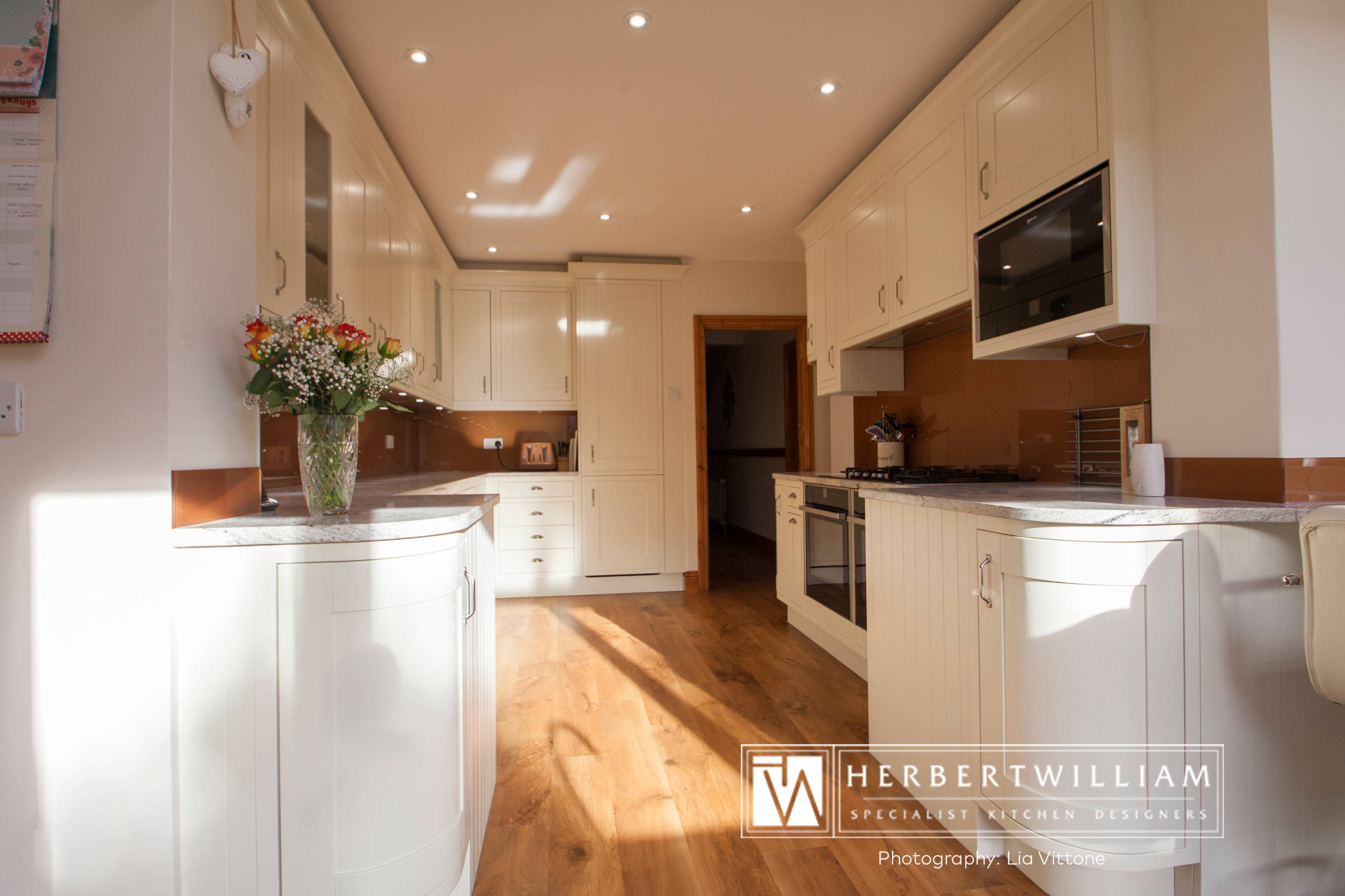 Ivory Mackintosh Kitchen With Stunning Copper Glass Splashback Kitchen Hampshire By Herbert William Limited Houzz