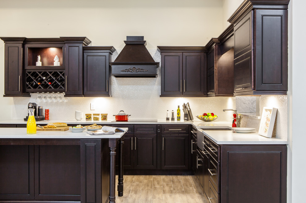 Contemporary kitchen in New York with flat-panel cabinets and dark wood cabinets.
