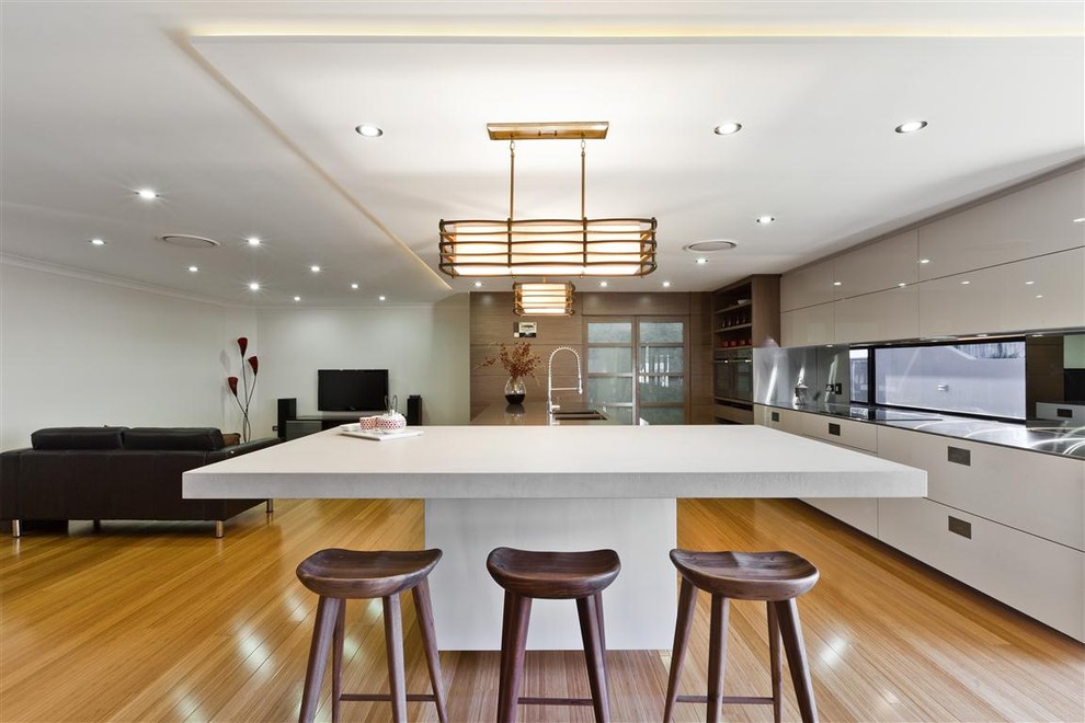 Example of a trendy kitchen design in Brisbane