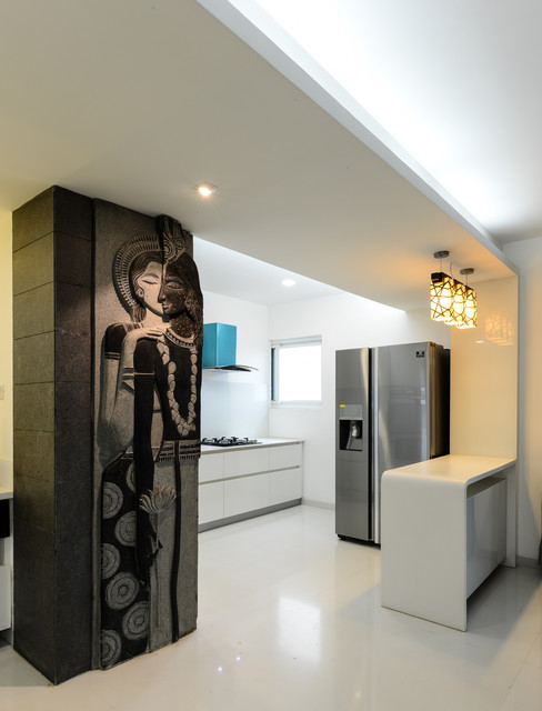Inside view of a clean, organized garage attached to an Orange County apartment, showcasing storage solutions