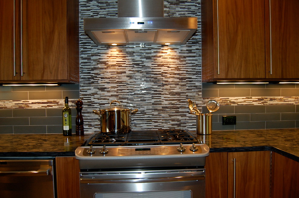 This is an example of a contemporary kitchen in Raleigh.