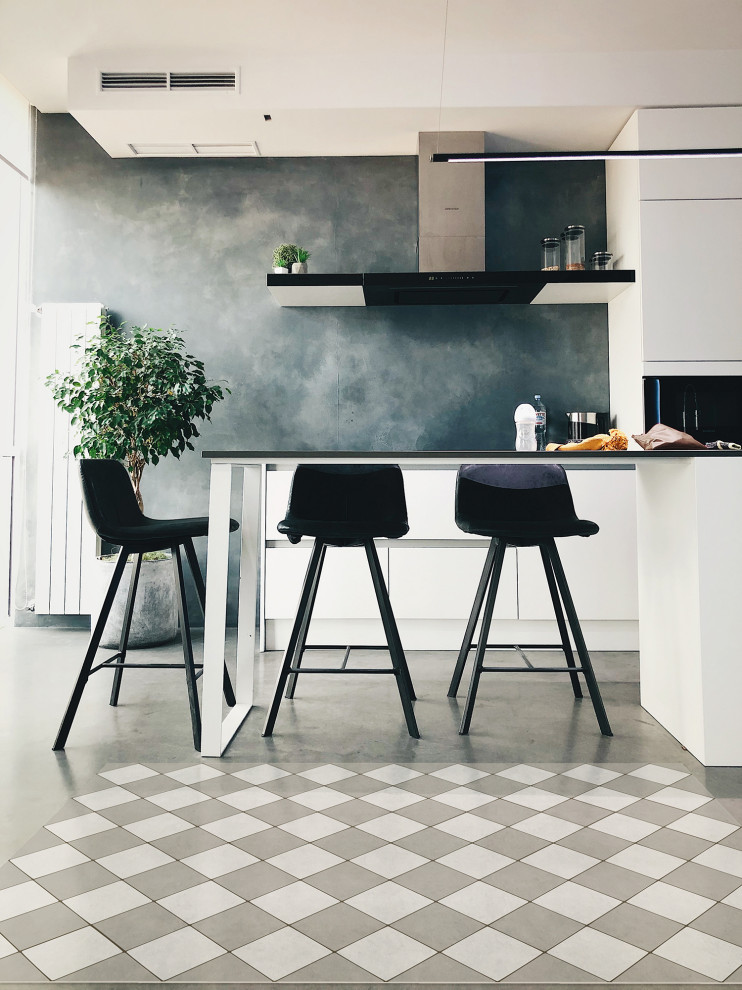 Esempio di una cucina minimal con pavimento in vinile e pavimento grigio