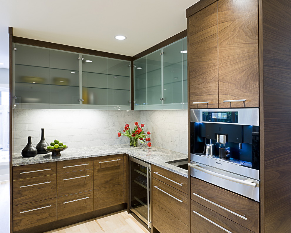 Inspiration for a contemporary kitchen remodel in Minneapolis with granite countertops