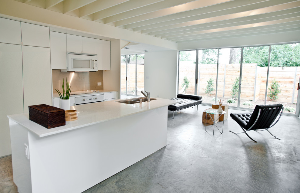 Photo of a modern kitchen in Dallas with white appliances.
