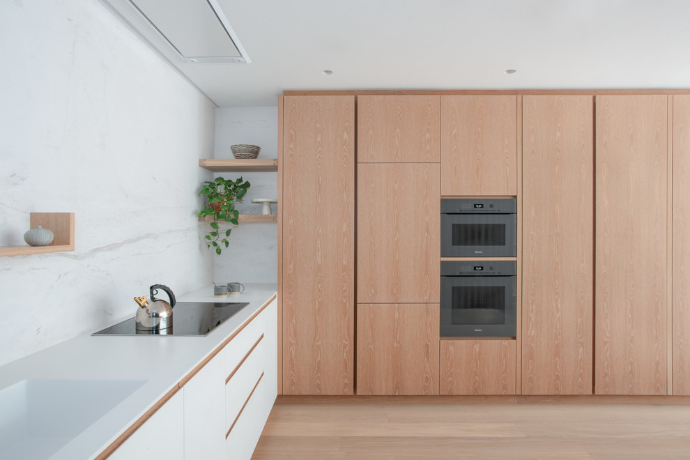 Mittelgroße Moderne Wohnküche in L-Form in London