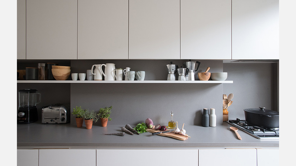 Photo of a contemporary galley kitchen in London.