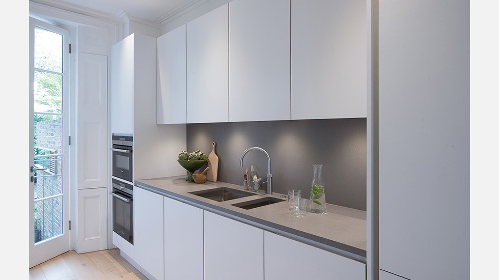 Design ideas for a contemporary galley kitchen in London.