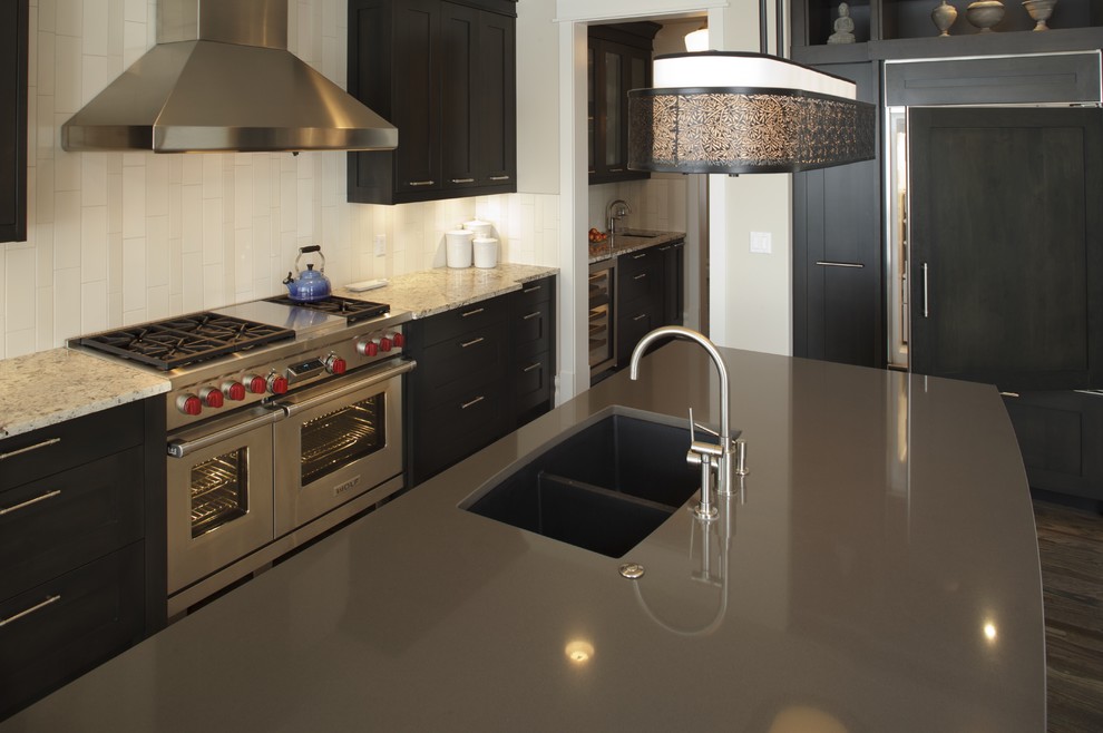 This is an example of a classic grey and cream kitchen in Calgary.