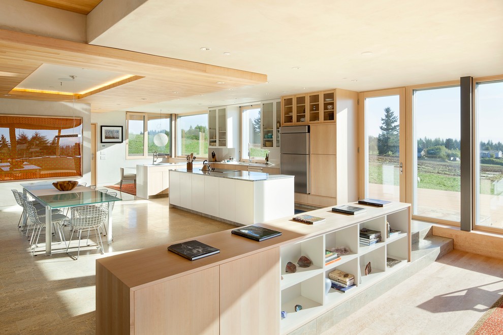 Inspiration for a contemporary kitchen/diner in Portland with flat-panel cabinets and light wood cabinets.