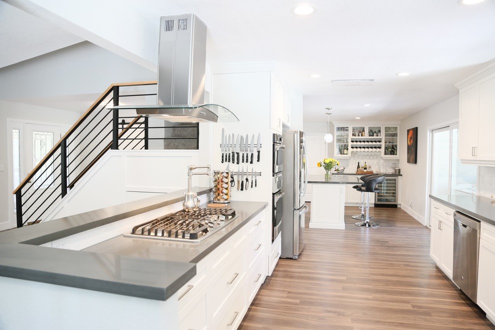 Example of a transitional kitchen design in Other with shaker cabinets