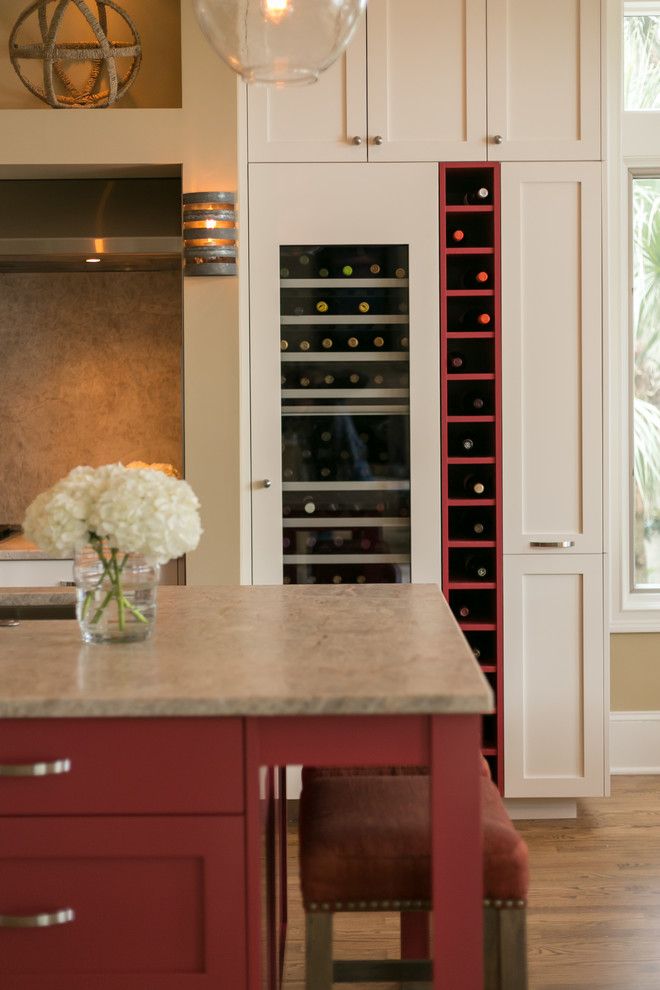 Transitional medium tone wood floor eat-in kitchen photo in Charleston with shaker cabinets, red cabinets, granite countertops and an island