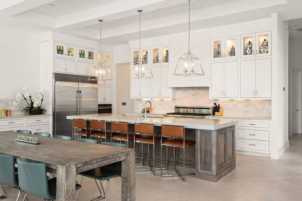 Transitional l-shaped beige floor eat-in kitchen photo in Orlando with an undermount sink, recessed-panel cabinets, white cabinets, gray backsplash, stainless steel appliances, an island and gray countertops