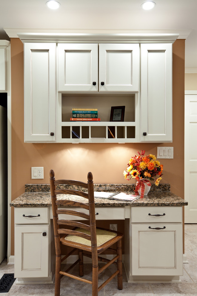 Example of a mid-sized classic single-wall porcelain tile and beige floor eat-in kitchen design in Atlanta with recessed-panel cabinets, white cabinets, granite countertops and brown countertops