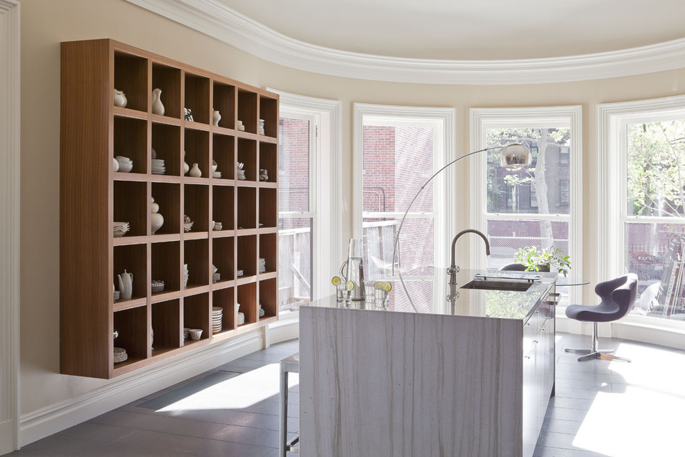 Inspiration for a contemporary enclosed kitchen remodel in New York with quartzite countertops and open cabinets