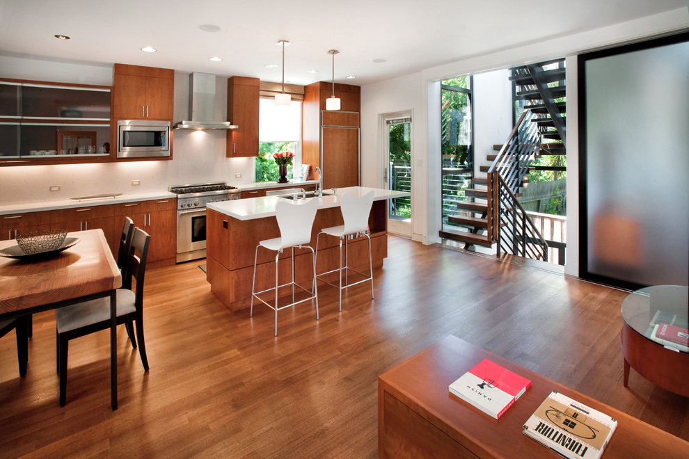 Trendy open concept kitchen photo in San Francisco with paneled appliances, white backsplash and ceramic backsplash