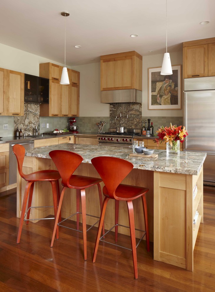 Example of a transitional l-shaped kitchen design in San Francisco with stainless steel appliances, granite countertops, shaker cabinets and light wood cabinets