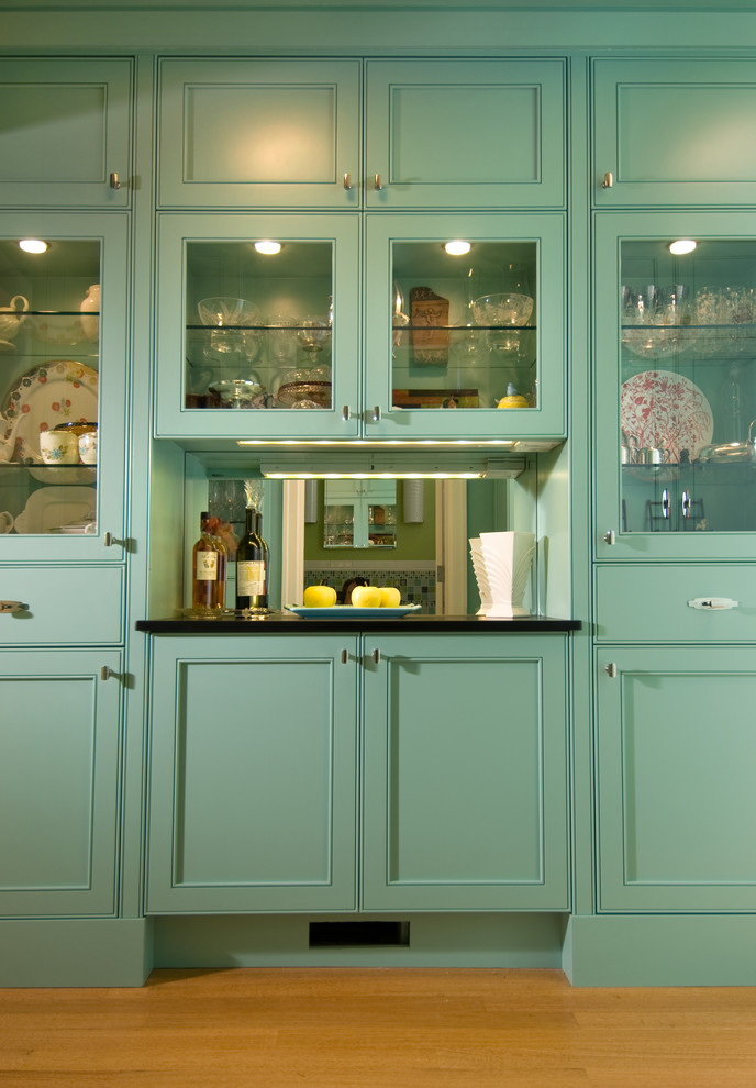 Design ideas for a contemporary kitchen in Seattle with beaded cabinets and turquoise cabinets.