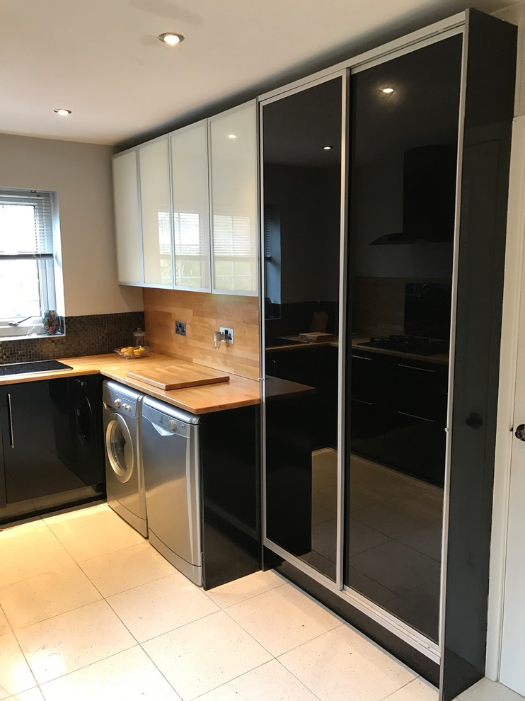 This is an example of a small contemporary kitchen in West Midlands.