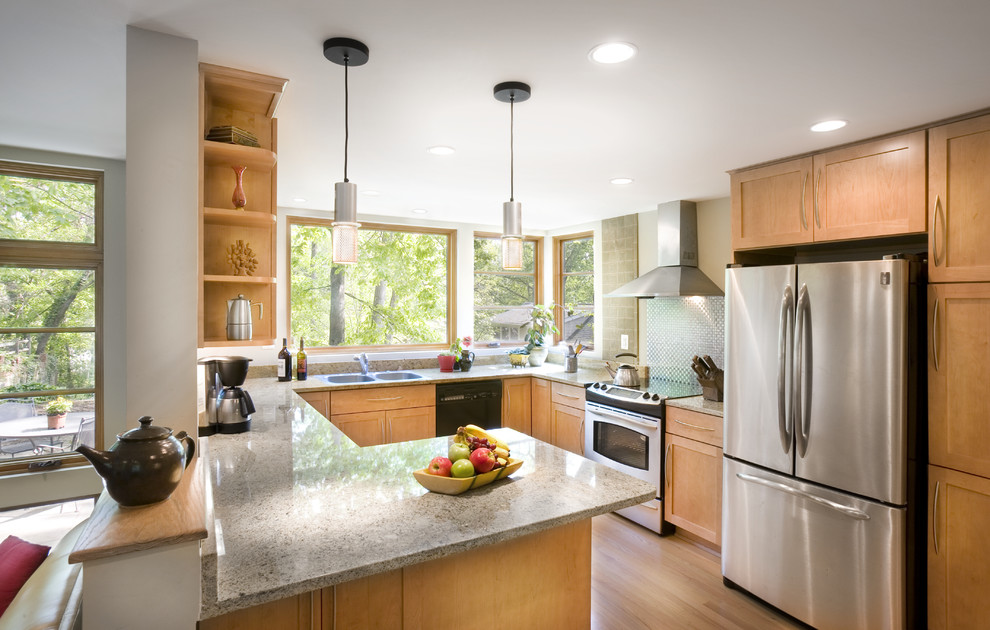 Design ideas for a contemporary u-shaped kitchen in DC Metro with stainless steel appliances.