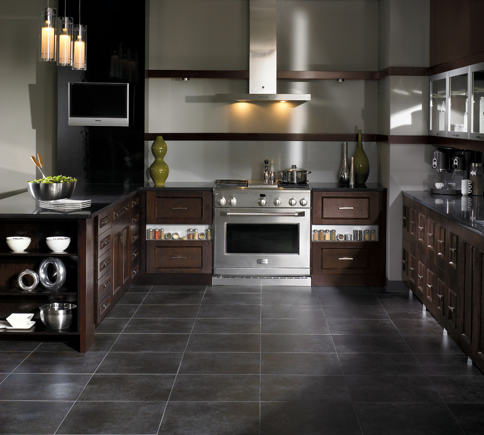 Inspiration for a large craftsman u-shaped porcelain tile kitchen remodel in New York with flat-panel cabinets, dark wood cabinets, stainless steel appliances and a peninsula