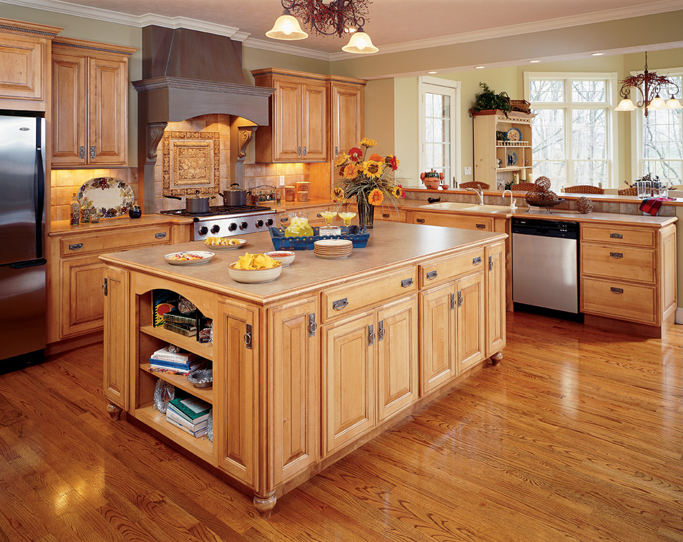 This is an example of a traditional kitchen in Other with stainless steel appliances.