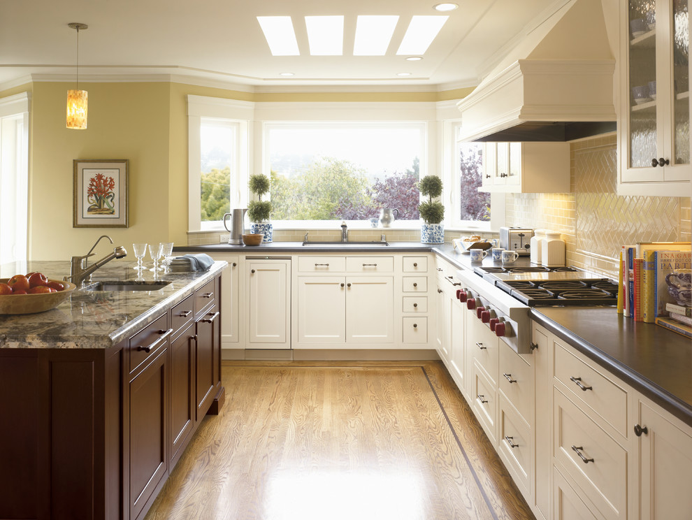 Design ideas for a traditional kitchen in Other with recessed-panel cabinets, white cabinets and beige splashback.