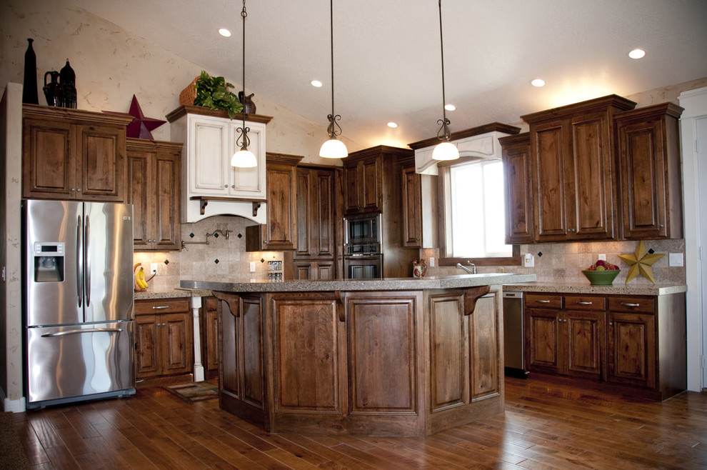 Inspiration for a mid-sized transitional u-shaped dark wood floor and beige floor open concept kitchen remodel in Salt Lake City with flat-panel cabinets, white cabinets, quartz countertops, beige backsplash, matchstick tile backsplash, stainless steel appliances, an island and white countertops