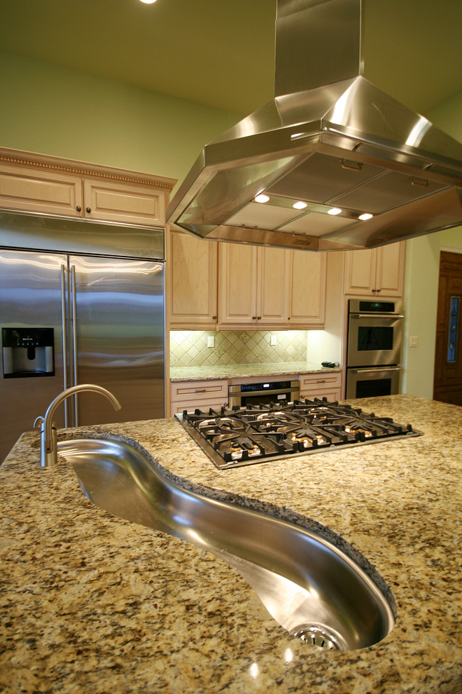 Example of a large classic galley ceramic tile eat-in kitchen design in Orlando with a double-bowl sink, raised-panel cabinets, light wood cabinets, granite countertops, red backsplash, ceramic backsplash, stainless steel appliances and two islands