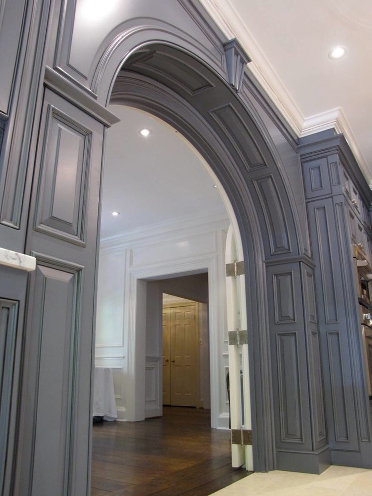 Inspiration for a timeless eat-in kitchen remodel in DC Metro with raised-panel cabinets and blue cabinets