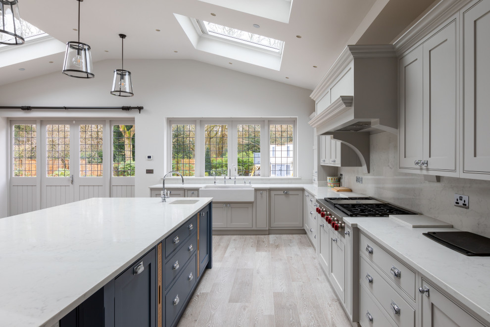 Example of a cottage kitchen design in London