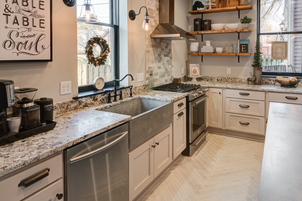 Inspiration for an eclectic ceramic tile kitchen remodel in Columbus with a farmhouse sink, recessed-panel cabinets, gray cabinets, granite countertops and stainless steel appliances
