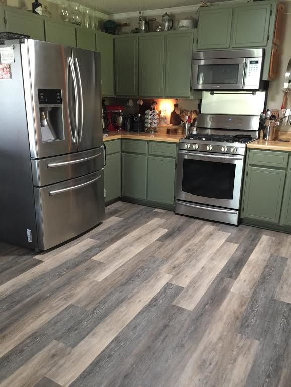 Inspiration for a small farmhouse l-shaped vinyl floor open concept kitchen remodel in Miami with beaded inset cabinets, green cabinets, laminate countertops, stainless steel appliances and no island