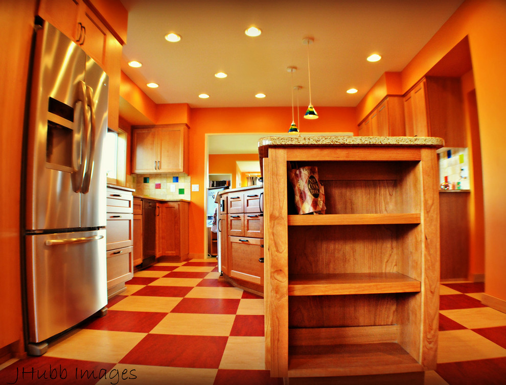 Example of a large arts and crafts galley linoleum floor eat-in kitchen design in Other with an undermount sink, shaker cabinets, medium tone wood cabinets, quartzite countertops, multicolored backsplash, glass tile backsplash, stainless steel appliances and an island