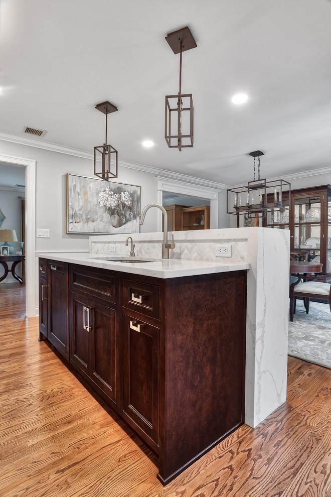 Kitchen Island Doubles as Prep Space and Counter for Seating