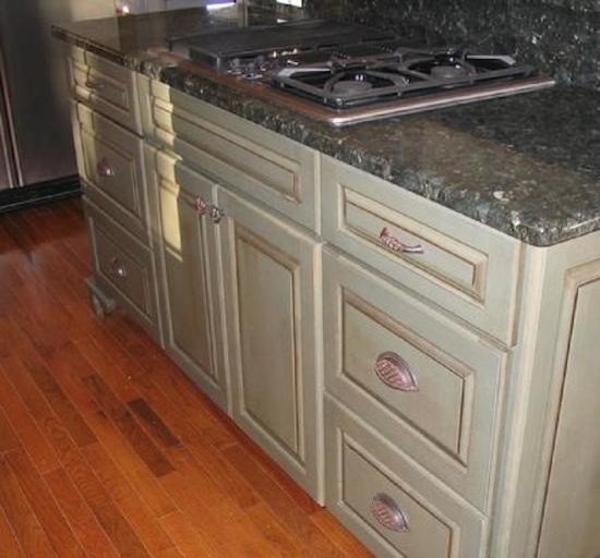 Example of a mid-sized classic medium tone wood floor eat-in kitchen design in Richmond with distressed cabinets, terrazzo countertops, multicolored backsplash, stone tile backsplash and stainless steel appliances