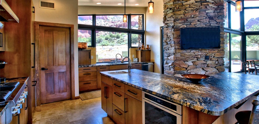 Inspiration for a mid-sized southwestern l-shaped travertine floor open concept kitchen remodel in Phoenix with flat-panel cabinets, medium tone wood cabinets, beige backsplash, stainless steel appliances, an island, an undermount sink, onyx countertops and ceramic backsplash