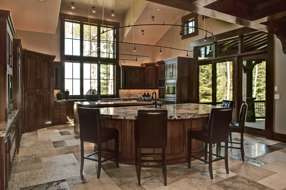 Design ideas for a traditional kitchen in Salt Lake City with recessed-panel cabinets and dark wood cabinets.