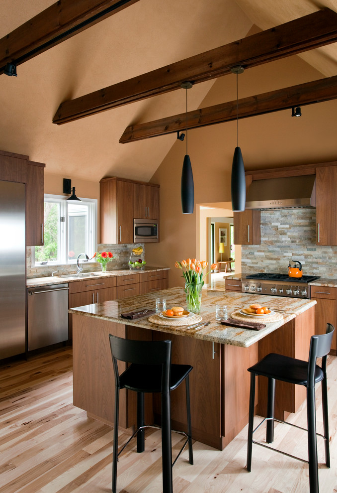 Example of a trendy kitchen design in Boston with stone tile backsplash