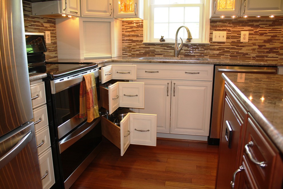 This is an example of a medium sized classic kitchen in DC Metro.