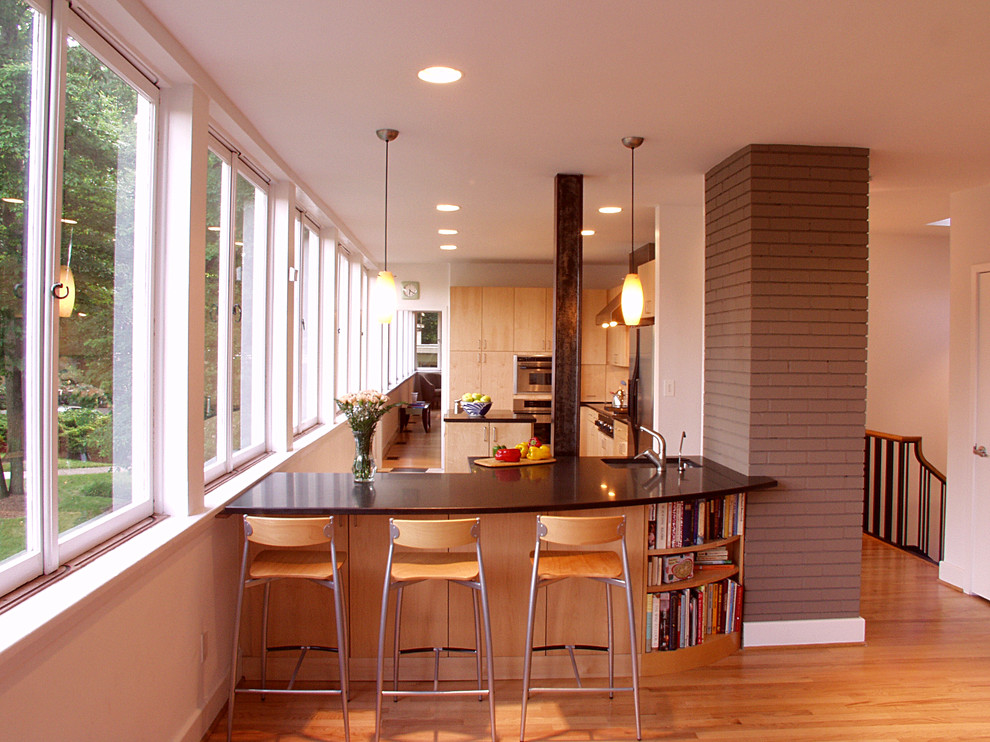 Inspiration for a modern kitchen in DC Metro with flat-panel cabinets and light wood cabinets.