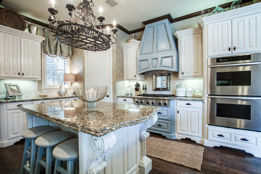 Example of a classic kitchen design in Atlanta with raised-panel cabinets and blue cabinets